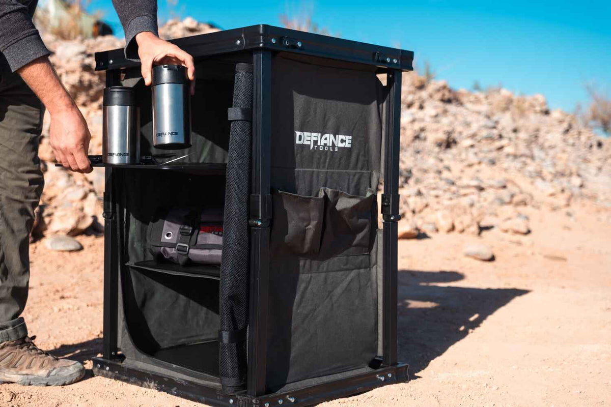 De-fiance folding camp table