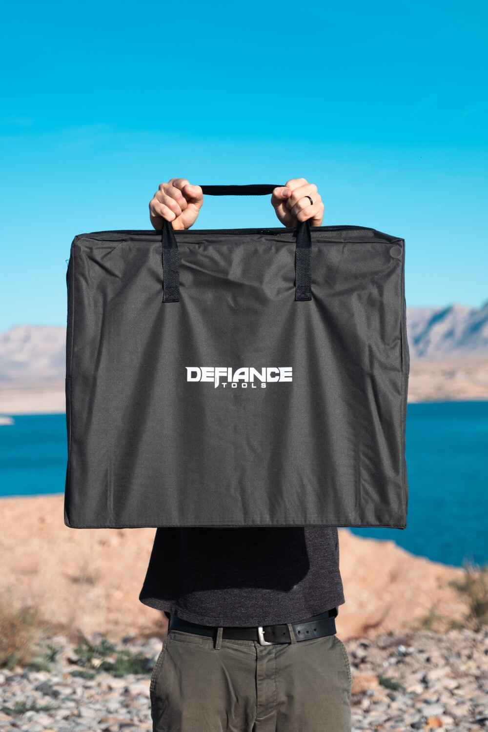 De-fiance folding camp table in carry bag