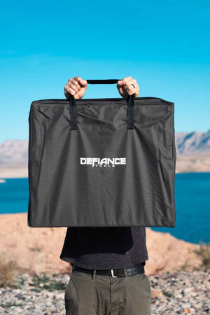 De-fiance folding camp table in carry bag
